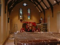 Internal decorating of a church in County Kerry using a mobile elevated platform. Total Paintworks Ltd., Ireland