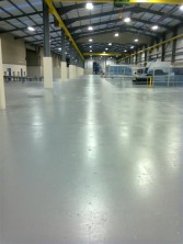 Industrial floor painting in Dairymaster warehouse at Causeway Co. Kerry Ireland  by Total Paintworks Ltd.