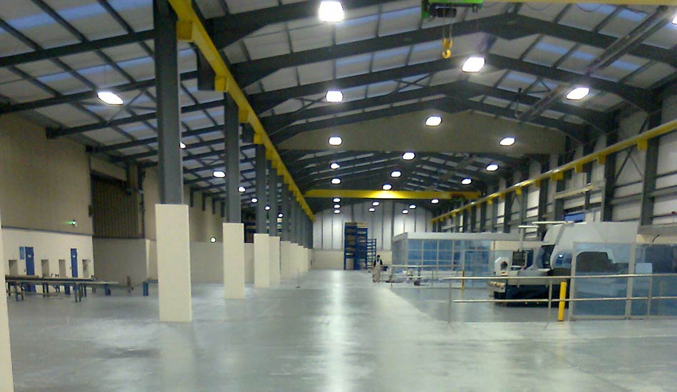 Industrial floor painting in Dairymaster warehouse at Causeway Co. Kerry Ireland  by Total Paintworks Ltd.