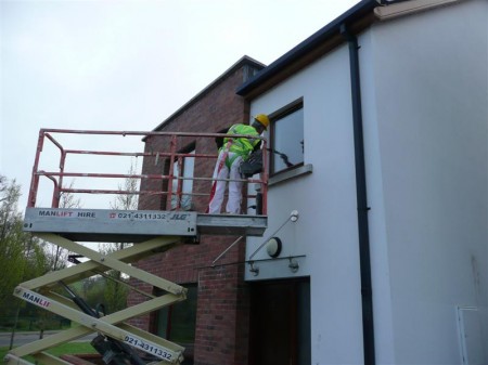 Safe painting using a mobile elevated platform. Full Public and Employers Insurance - Total Paintworks Ltd., Ireland